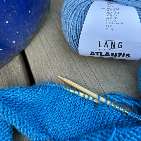 Knitted ATLANTIS yarn showing rich colour and smooth twist