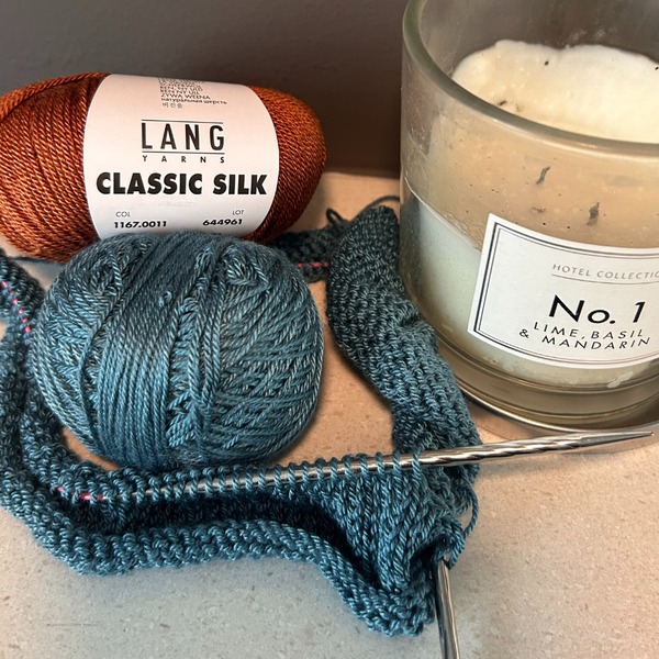 Ball of CLASSIC SILK showing soft sheen from silk blend