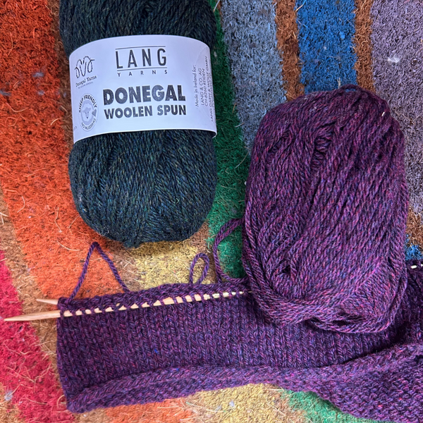 Ball of DONEGAL WOOLEN SPUN showing subtle flecked texture