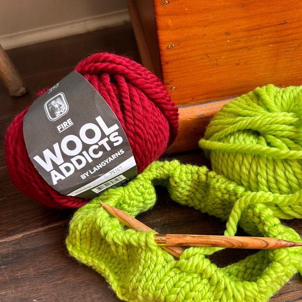 Ball of WOOLADDICTS FIRE showing its plush super chunky texture