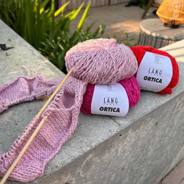 Close-up of knitted ORTICA fabric highlighting natural surface texture