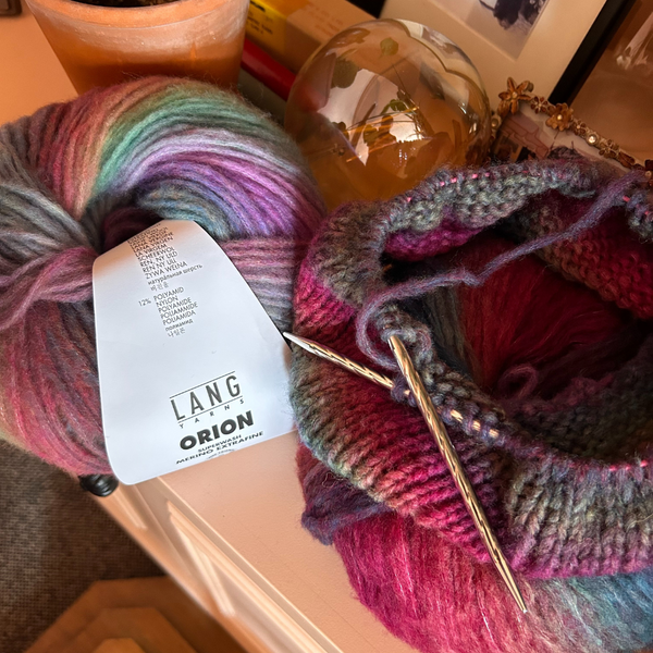 Close-up of ORION knitted fabric showing soft, lofty stitches
