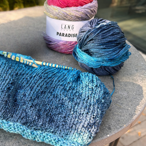 Close-up of PARADISE stitches with crisp definition and subtle shine
