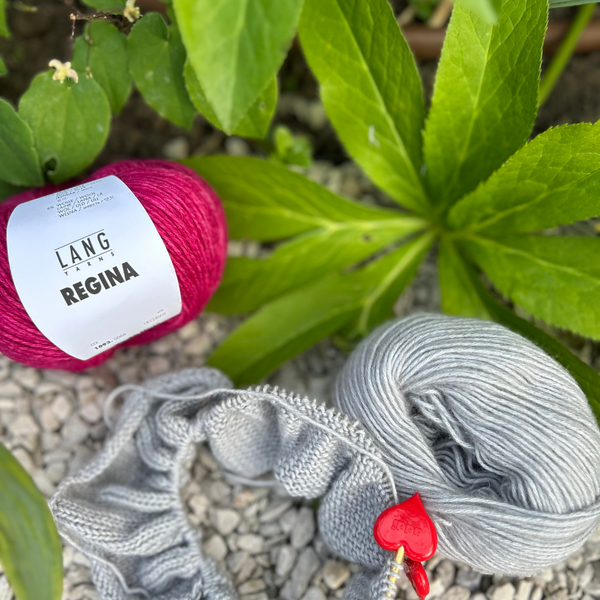 Close-up of REGINA stitches revealing soft drape and smooth finish