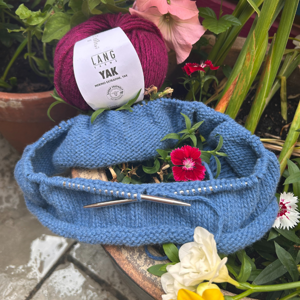 Close-up of Lang Yarns YAK yarn ball showing natural colour and soft texture
