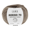 Ball of yarn with Lang Yarns Merino 70 label on a green background
